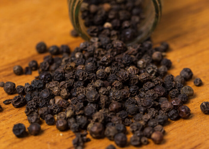 Spices. Heap of pepper on the table